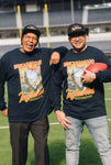 2 men in long sleeve tee